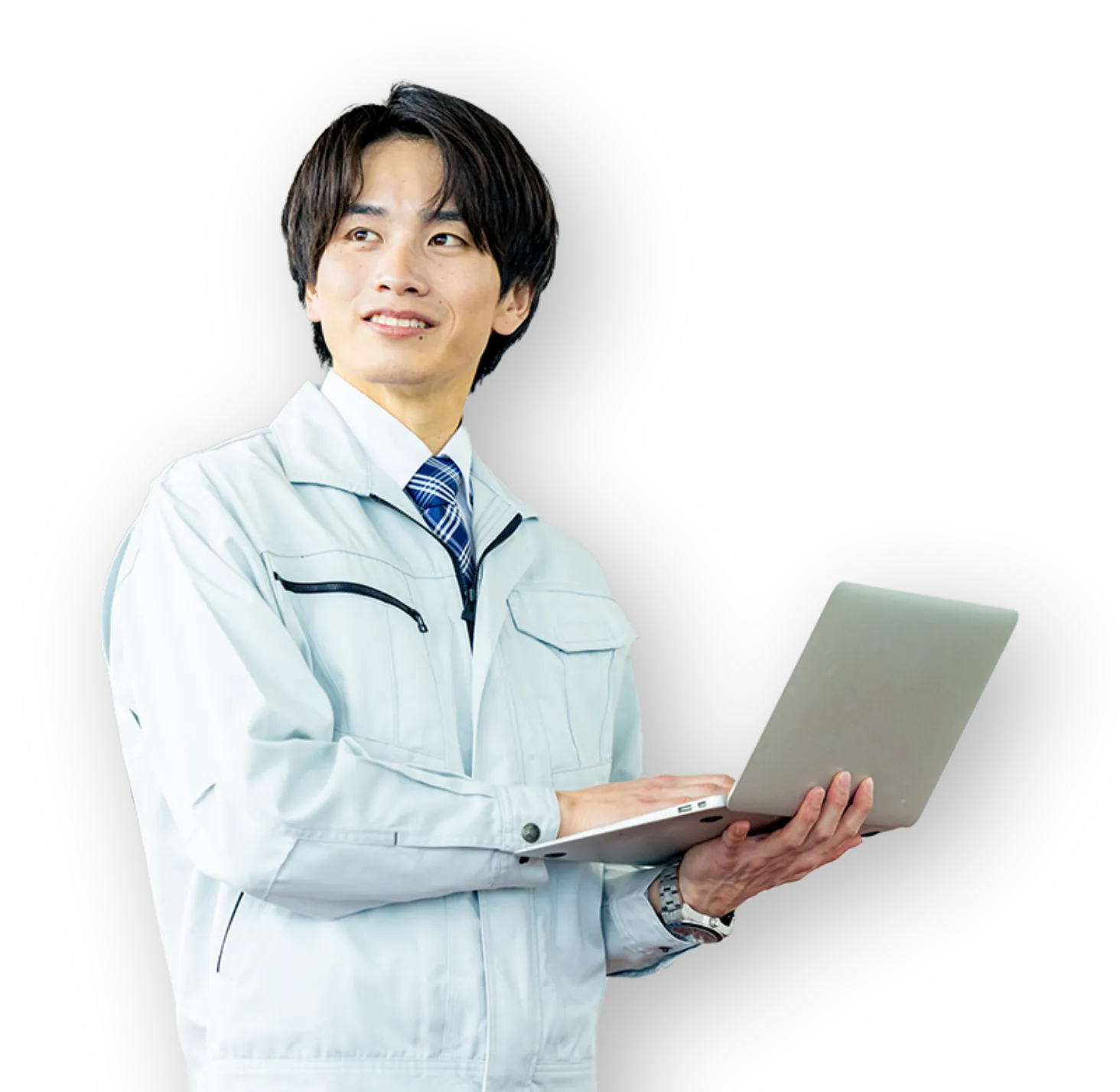 男性社員がノートPCを持っている